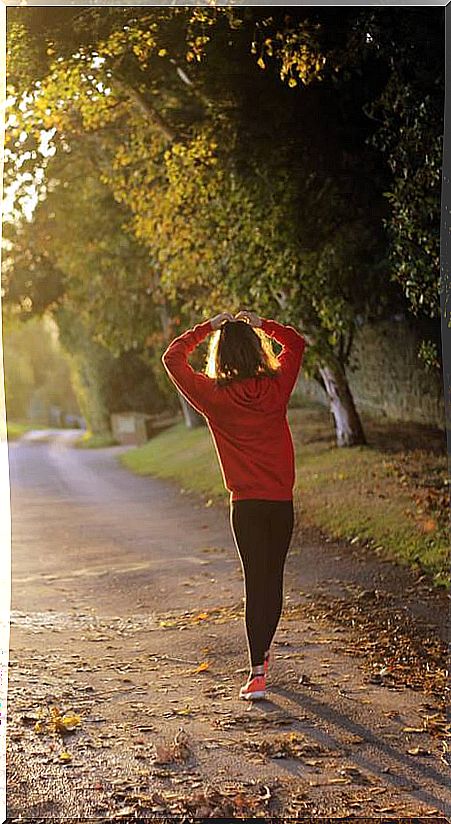 Woman exercising in field